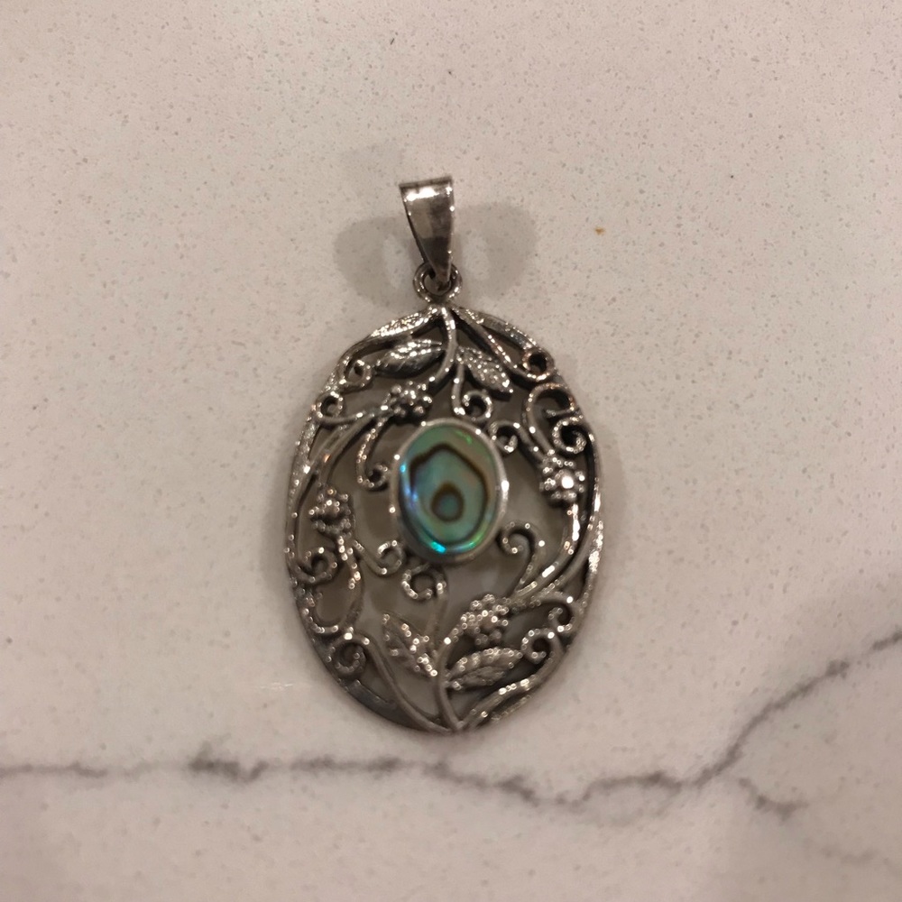 Sterling silver and abalone pendant with floral/leaf detail
